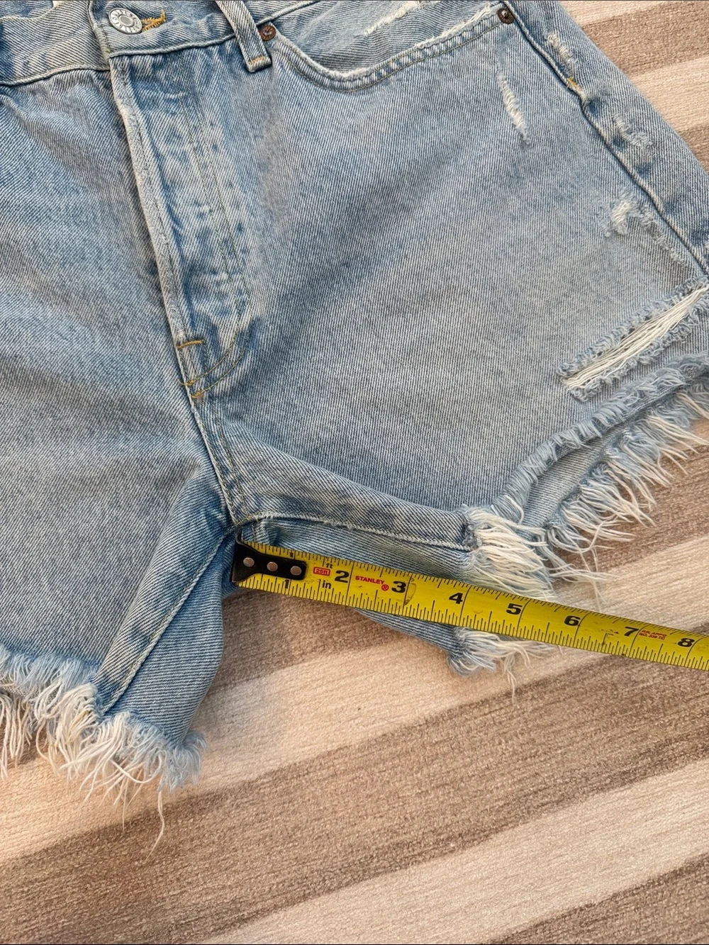 AGOLDE Medium Wash Frayed Hem Denim Cutoff Shorts